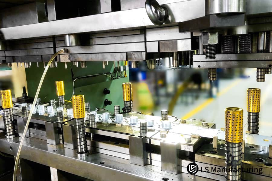 Pressing a 304 stainless steel enclosure with a custom die for automotive electrical system components.